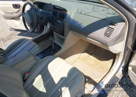 1999 Toyota Avalon Xls z USA, uszkodzony, nr VIN 4T1BF18B2XU322737